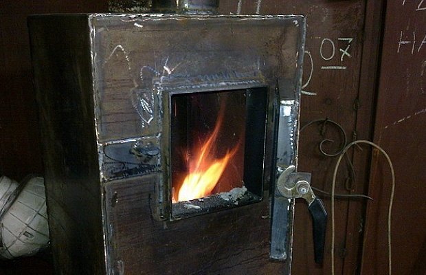 Фото самодельного отопительного котла с верхним горением